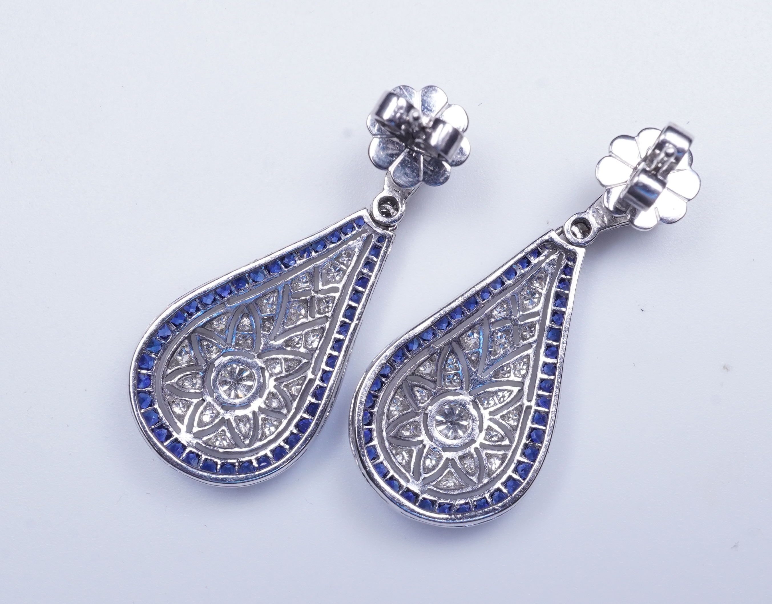 A pair of sapphire and diamond earrings